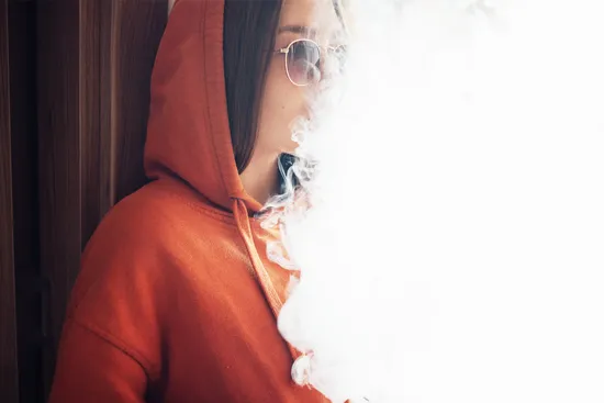 photo of lifestyle smoking vaping woman bright