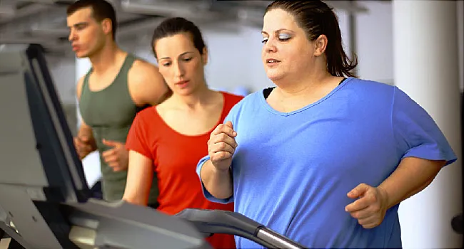 overweight woman working out