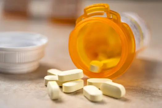 photo of prescription pills spilling from bottle