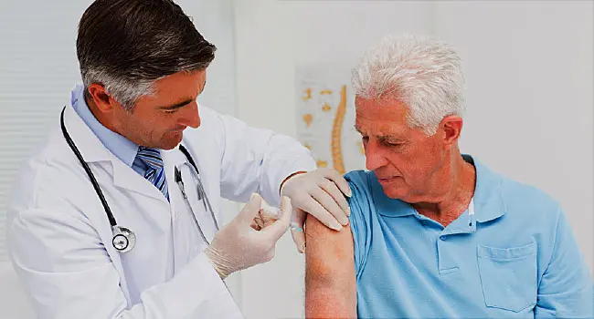 man getting vaccine