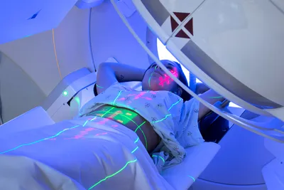 photo of woman receiving radiation therapy treatme