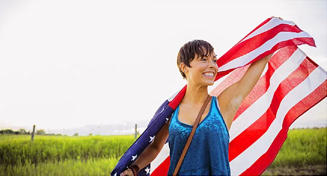 woman wrapped in american flag