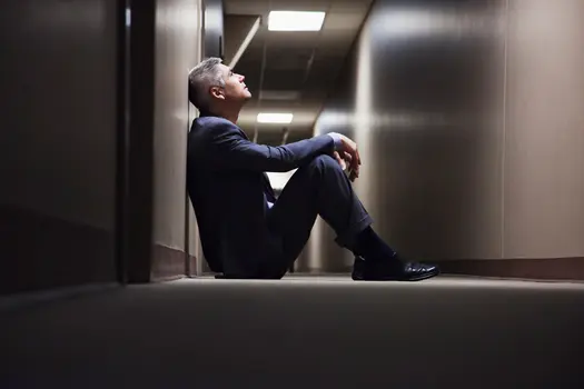 depressed man in hallway