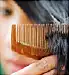 Close up of comb in woman's hair