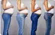 Four pregnant women standing in a row