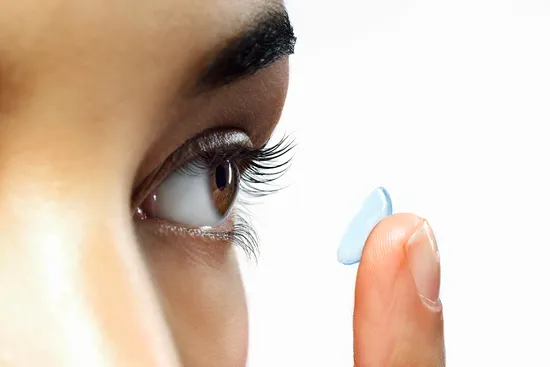 close-up of eye and contact lens