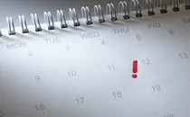 calendar with exclamation mark on date