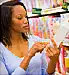 woman reading food label
