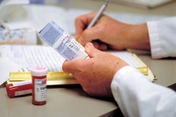 doctor writing prescriptiondoctor writing prescription