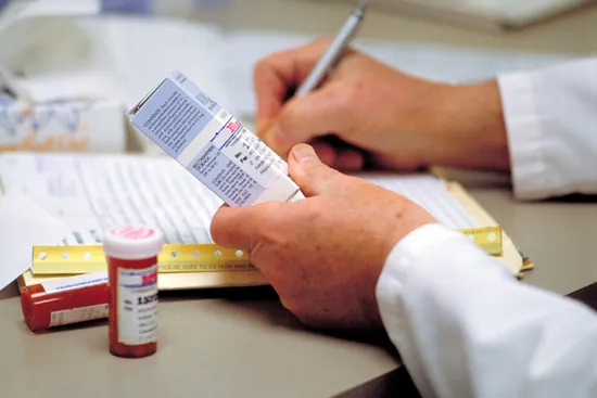 doctor writing prescriptiondoctor writing prescription