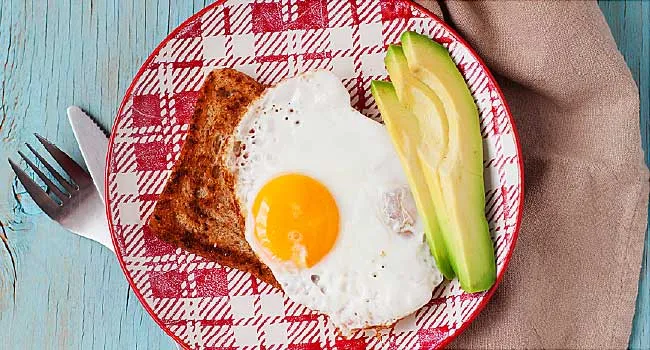 breakfast of egg toast avocado slices