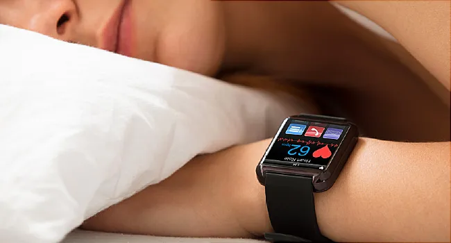 woman sleeping with smart watch on wrist