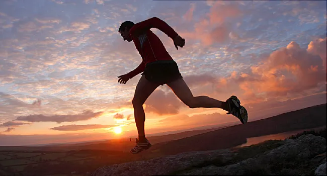 man running at sunset