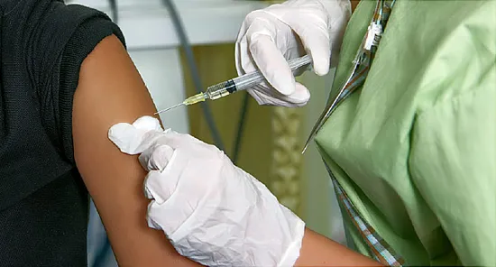 teen receiving vaccine