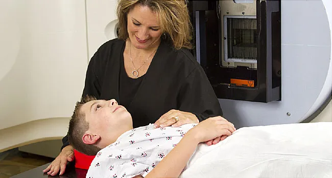 young boy undergoing radiation therapy