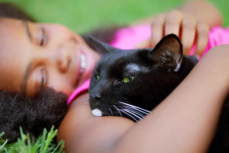 photo of girl and her cat