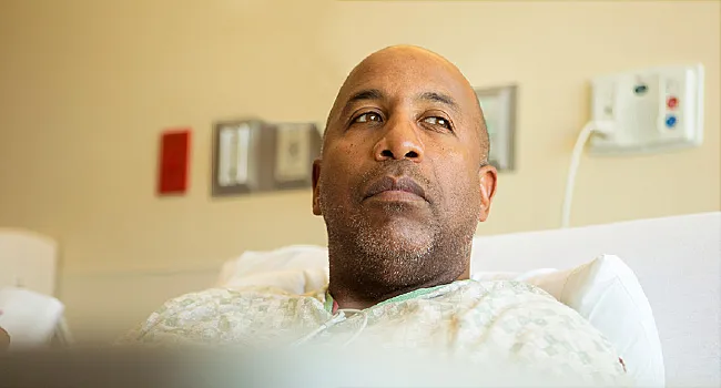 photo of man in hospital bed
