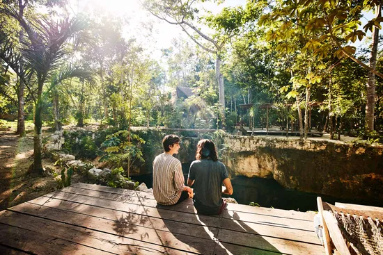 photo of couple relaxing, talking at eco resort