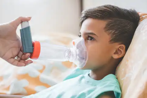 photo of child receiving breathing treatment