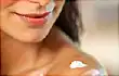 woman applying lotion