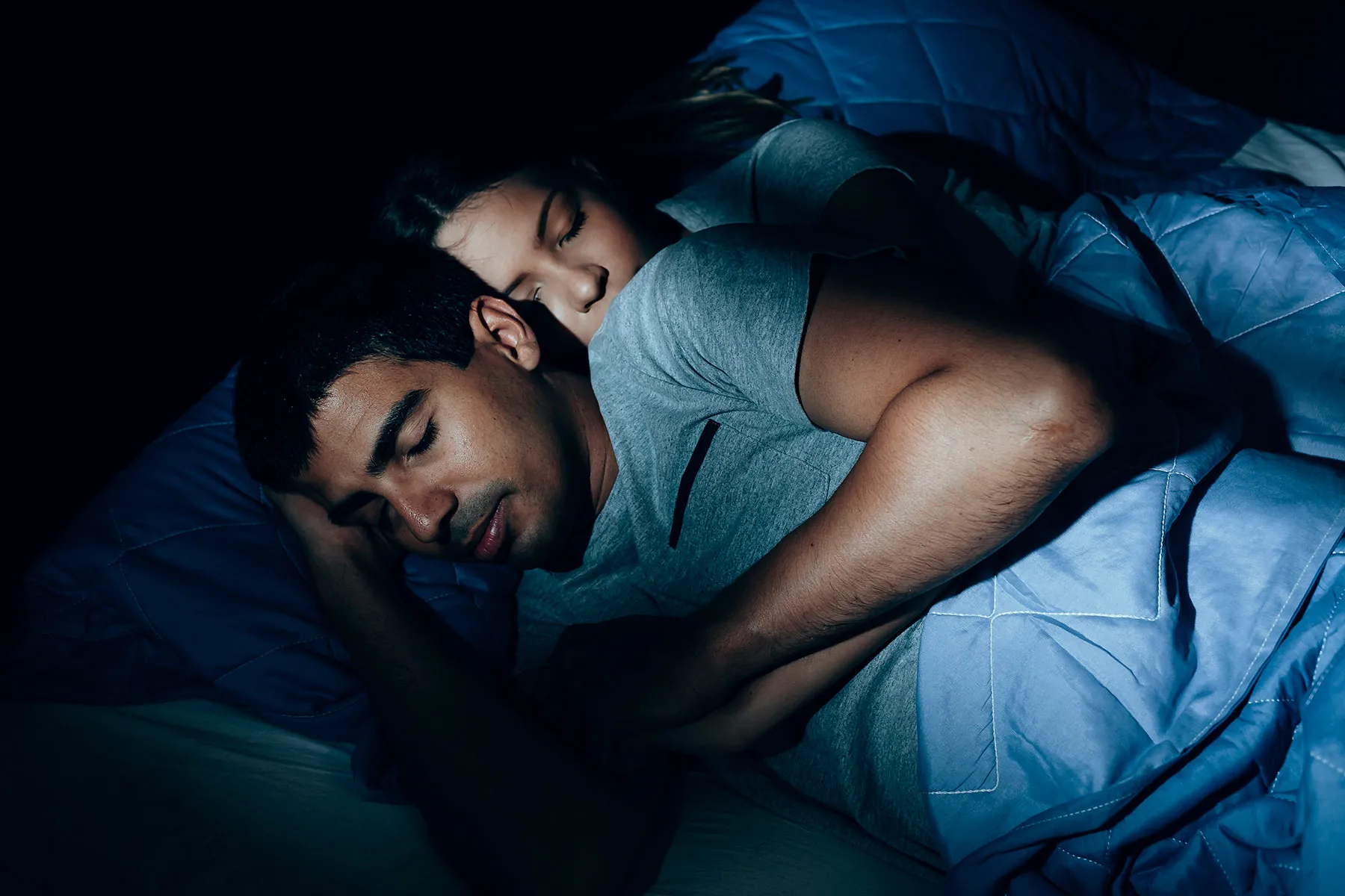 photo of couple sleeping