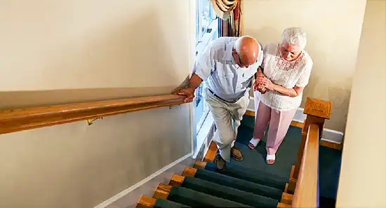 senior couple on stairs