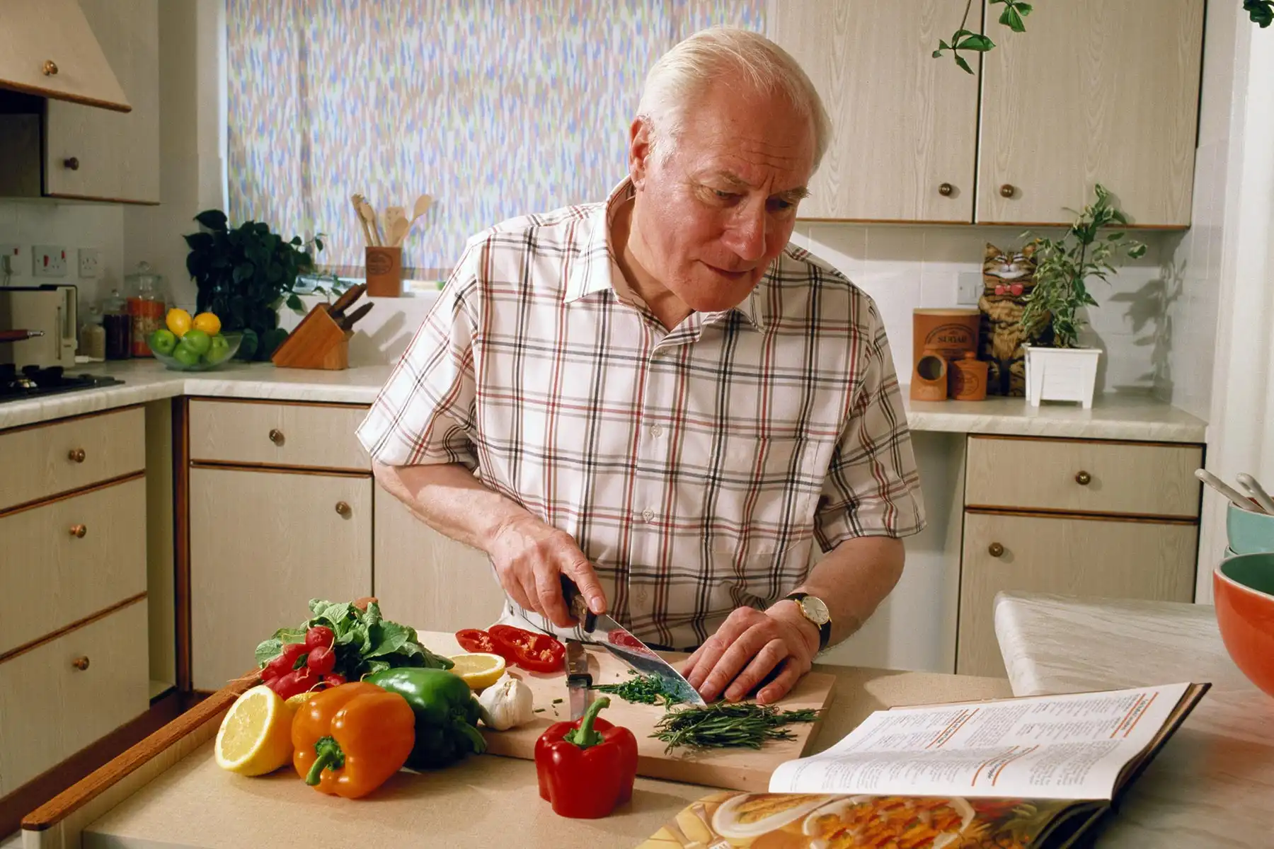 photo of mature man cooking