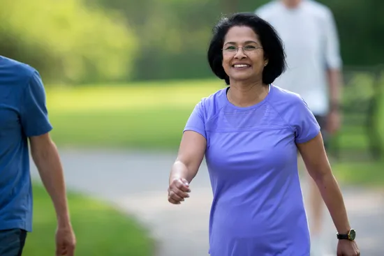 photo of mature woman walking for exercise