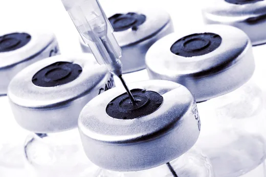 photo of syringe in via of medicationl