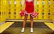 female cheerleader in locker room