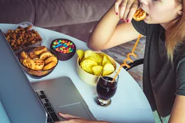 photo of woman stress eating