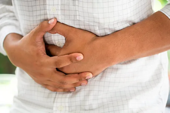 photo of person with stomach pain