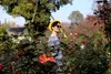 photo of woman in flowers