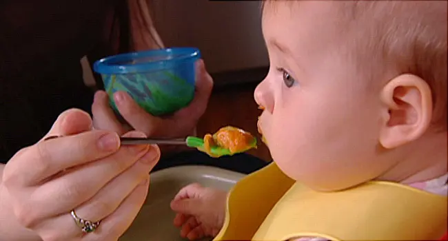 baby eating baby food