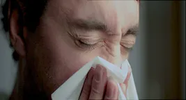 man_sneezing