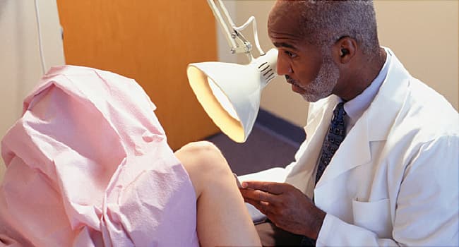 patient having gynaecological examination