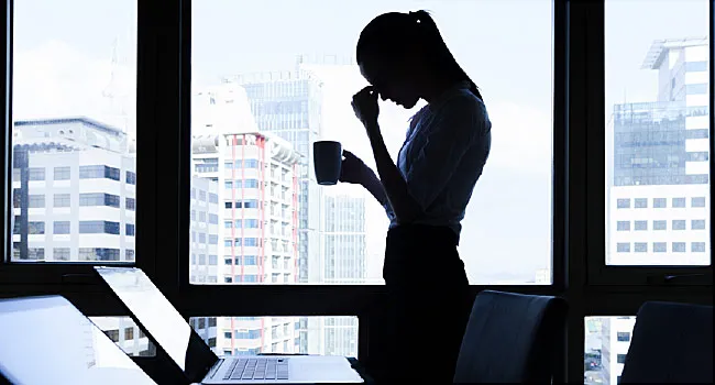 silhouette of stressed woman
