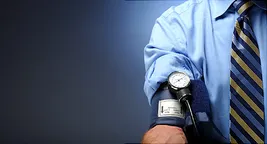 man checking blood pressure