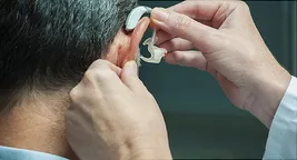 man with hearing aid