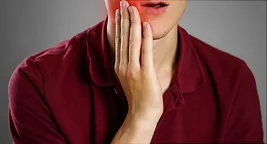 man with mouth pain