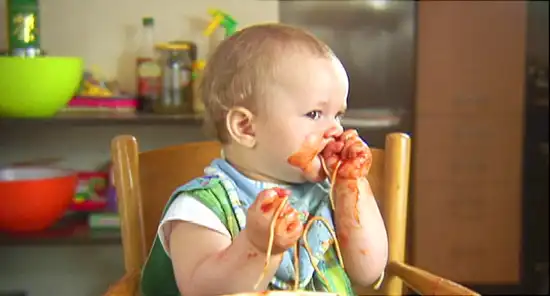 baby eating spaghetti 