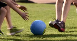 family playing with a ball