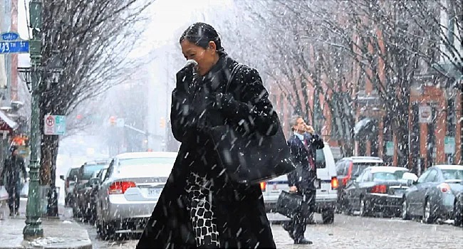woman walking in the snow