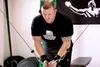 photo of man lifting weights