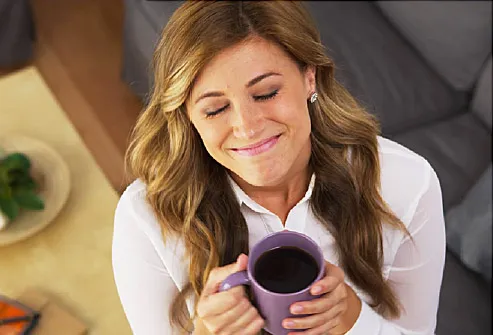 woman with cup of coffee