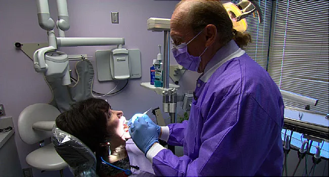 dentist working on teeth