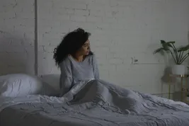 girl getting out of bed