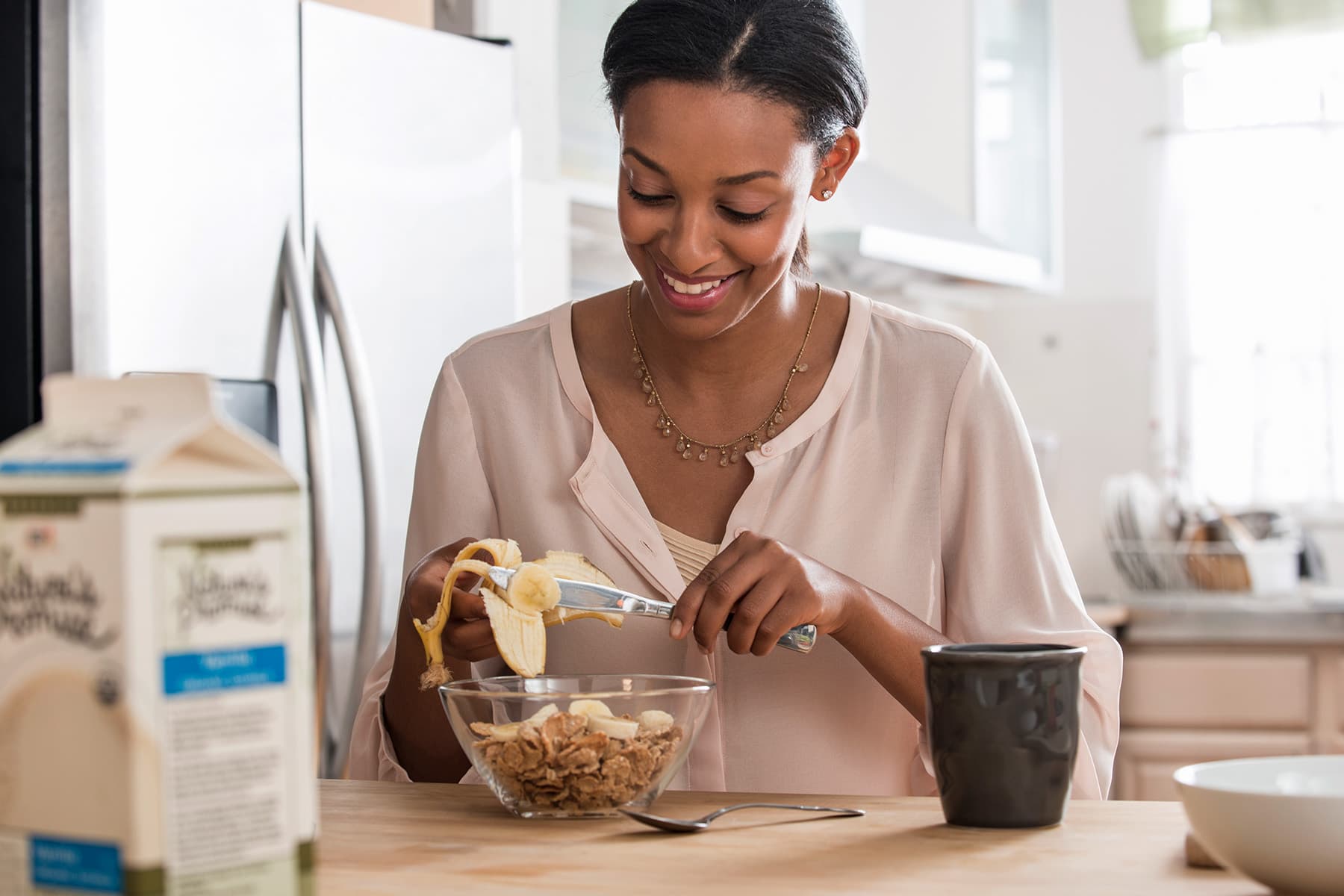 photo of woman having breakfast