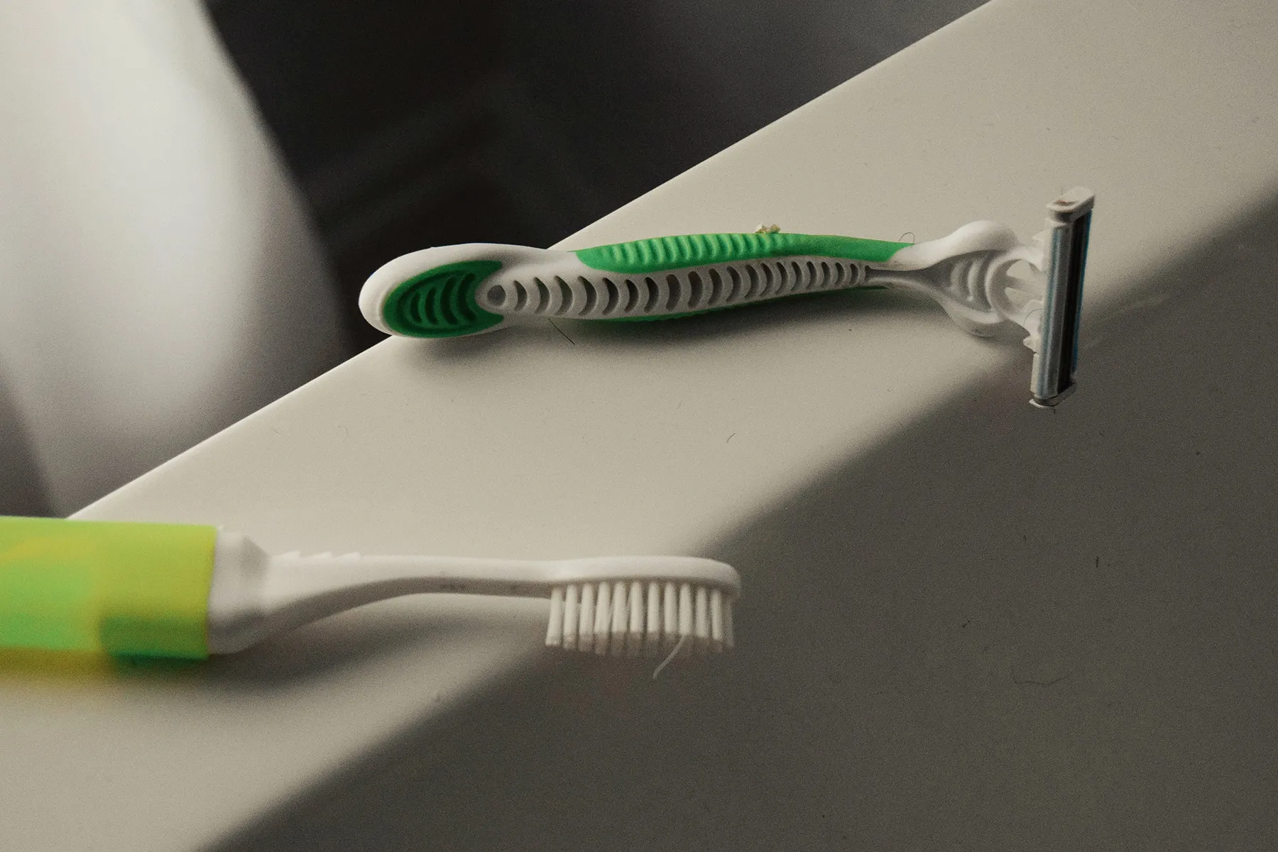 photo of toothbrush and razor