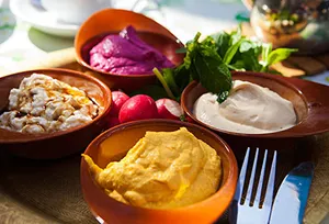 bowls of hummus and bean dips